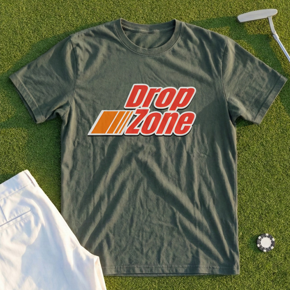 Green t-shirt with "Drop Zone" logo on a golf course.