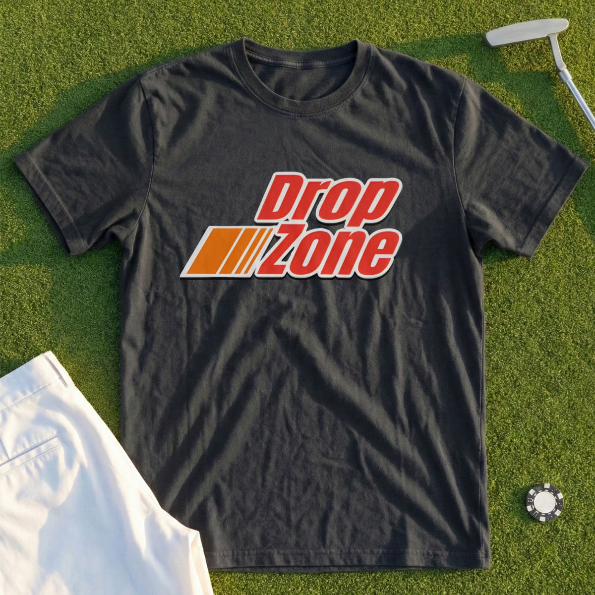 Black t-shirt with "Drop Zone" logo, on a golf course.