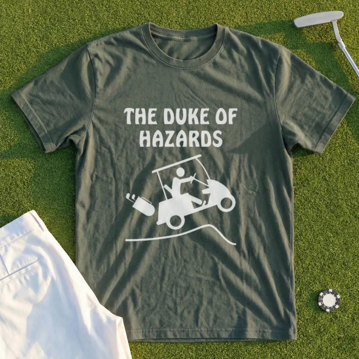 Olive green t-shirt with "The Duke of Hazards" text and a golf cart graphic.