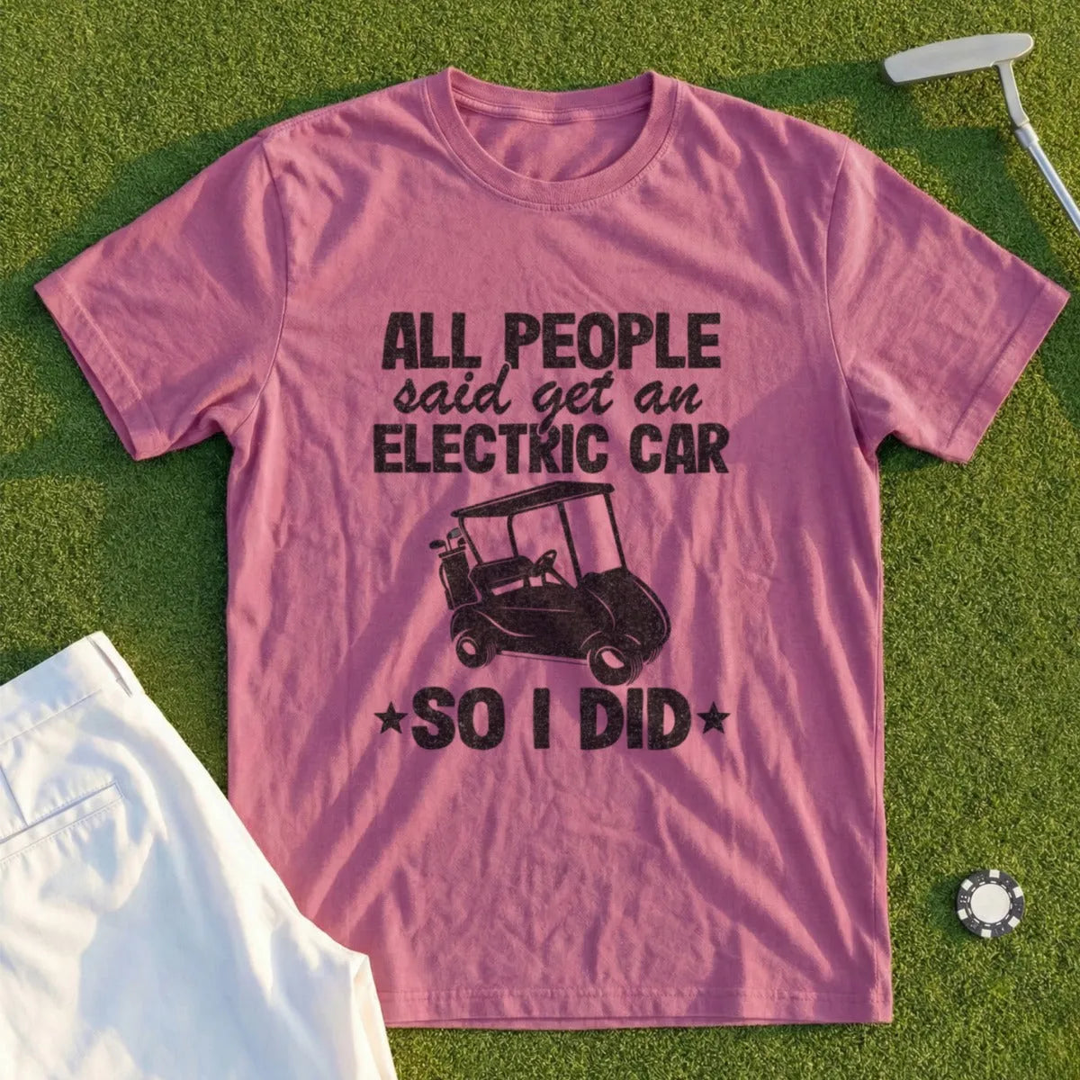 Burgundy t-shirt with "All people said get an electric car so I did" and golf cart graphic.