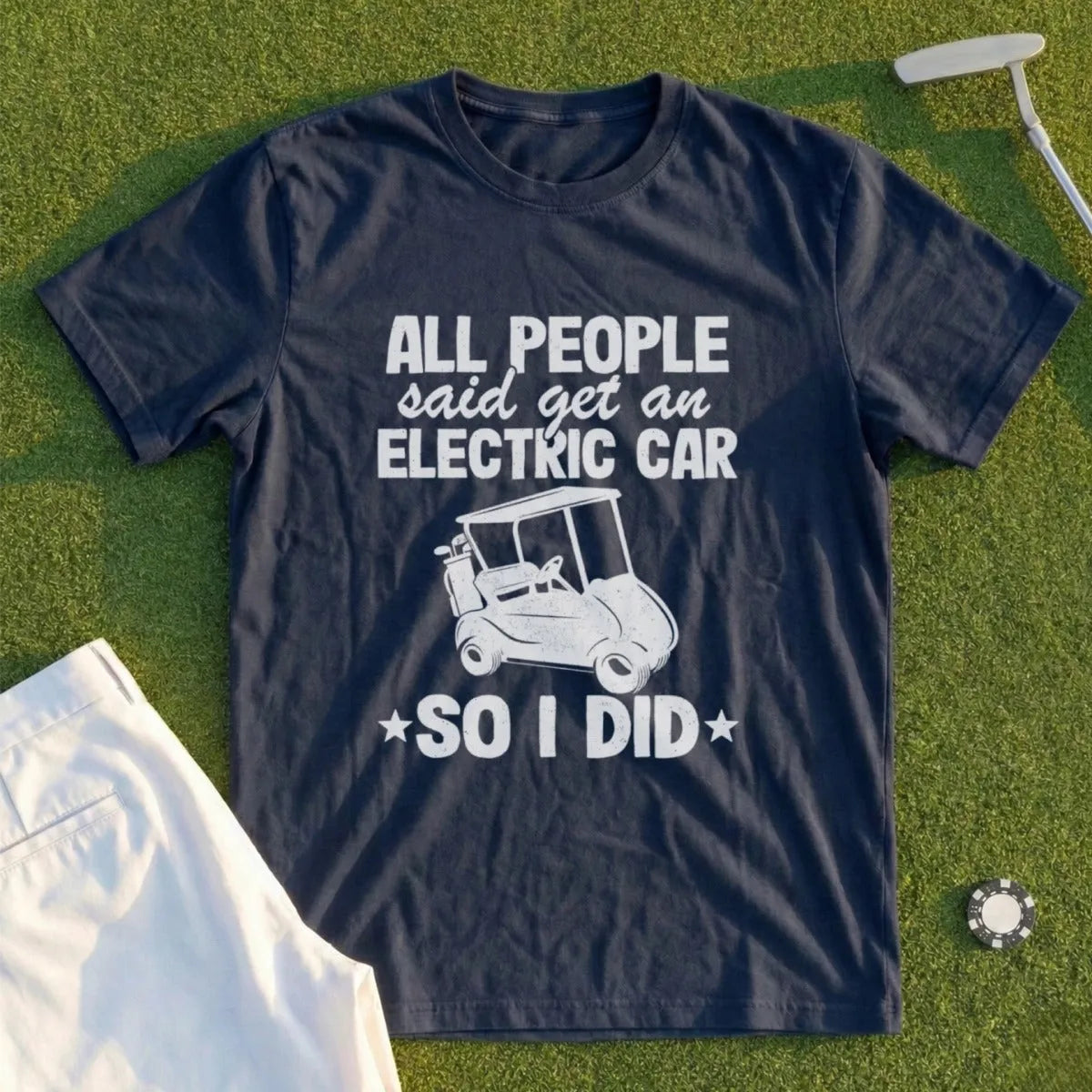 Navy t-shirt with "All people said get an electric car, so I did" and golf cart graphic.