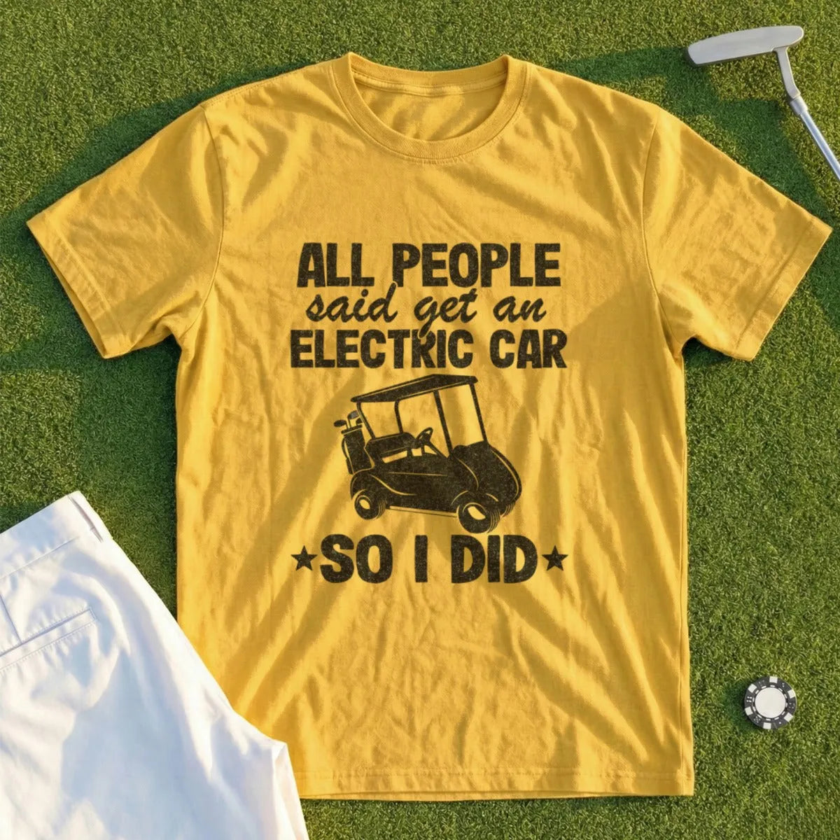 Yellow t-shirt with "All people said get an electric car so I did" text and golf cart graphic.