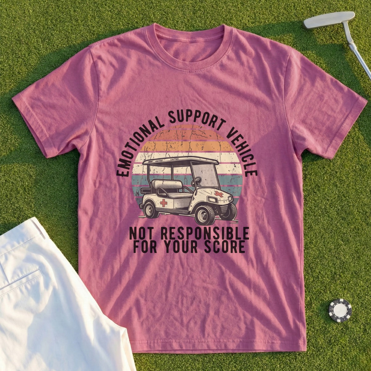 Pink t-shirt with "Emotional Support Vehicle" text and a golf cart graphic.