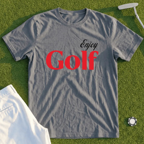 Gray t-shirt with "Enjoy Golf" text, displayed with golf accessories.