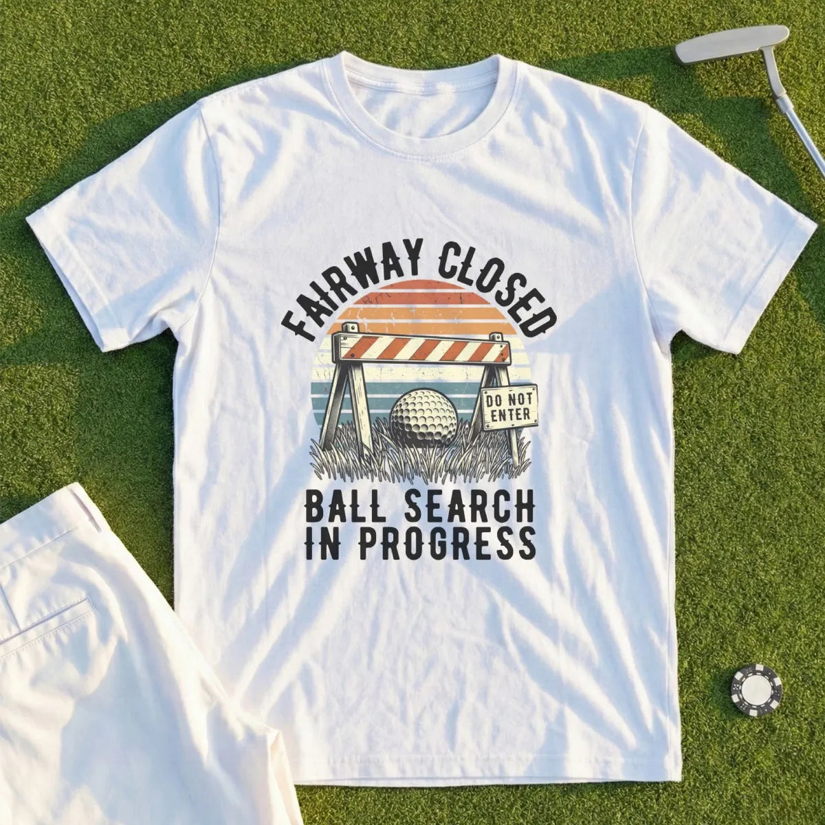 White t-shirt with "Fairway Closed, Ball Search In Progress" text and golf ball.