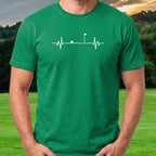 Flag EKG Tee worn on the golf course, Irish Green