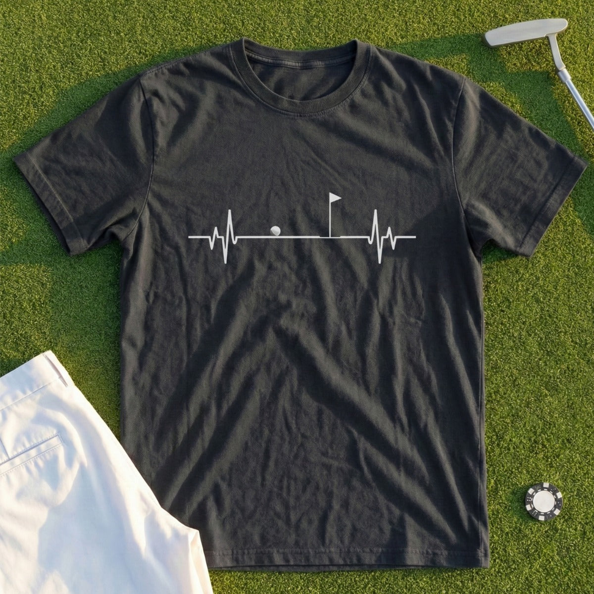 T-shirt with a heartbeat line design featuring a golf ball and flag.