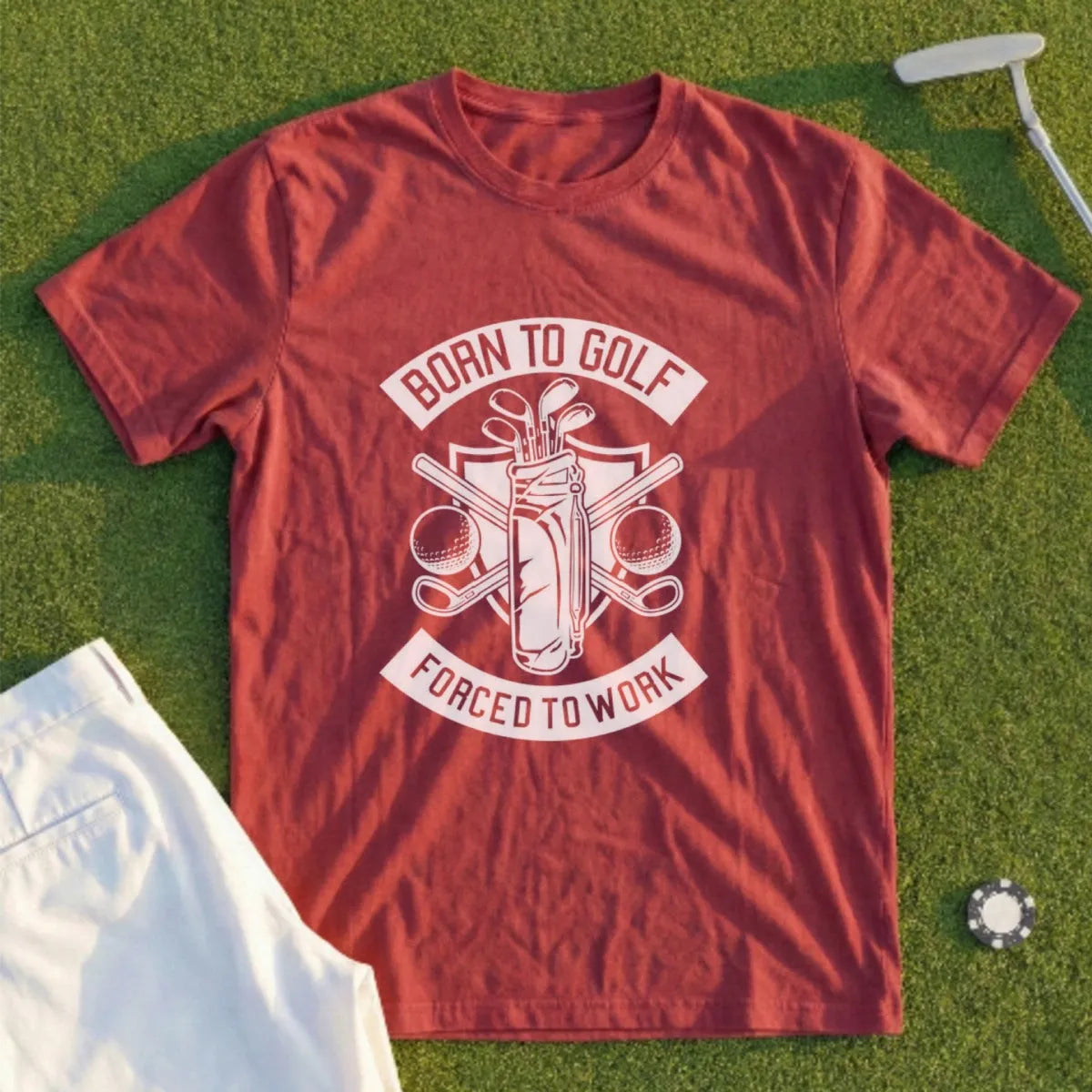 Maroon t-shirt with "Born to Golf, Forced to Work" text and golf equipment graphic.