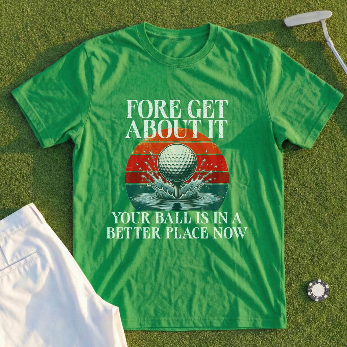 Green t-shirt with golf ball in water and text "Fore! Get It"