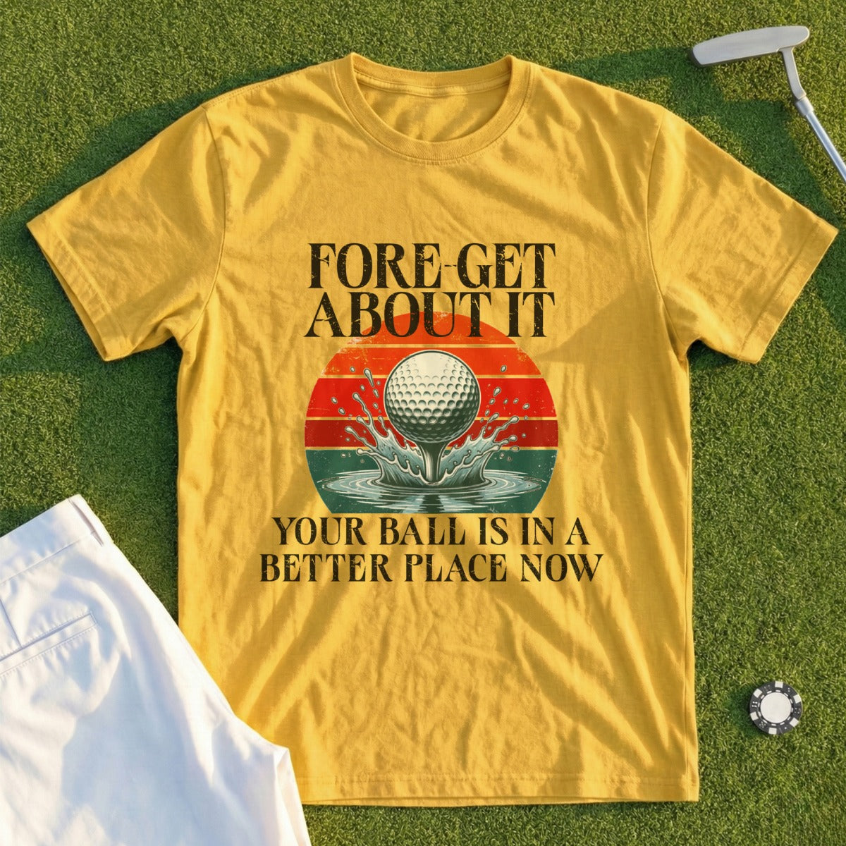 Yellow t-shirt with "Fore-get About It" and golf ball splashing water.