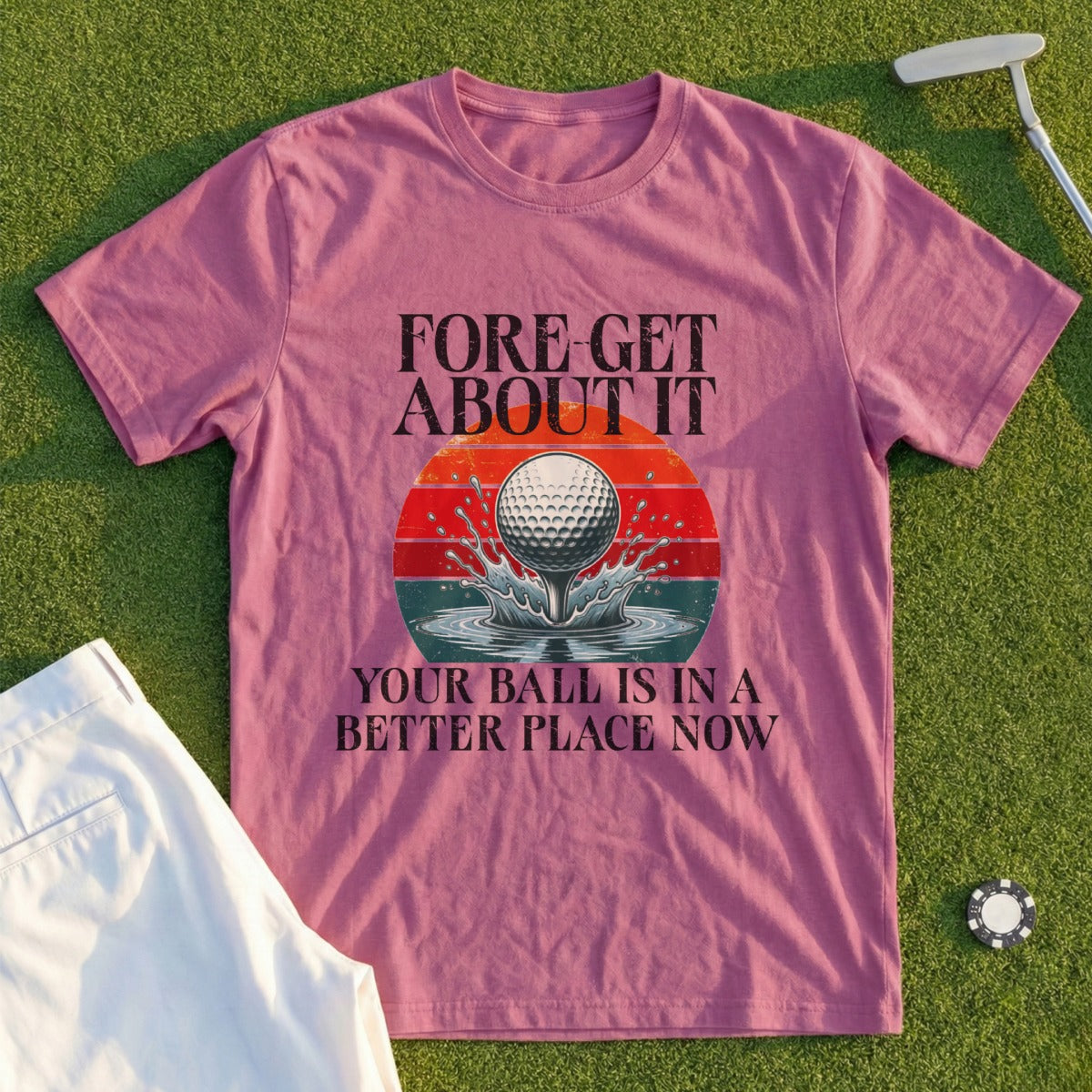 Pink t-shirt with "Fore-get It Your Ball Is In A Better Place Now" text and a golf ball.