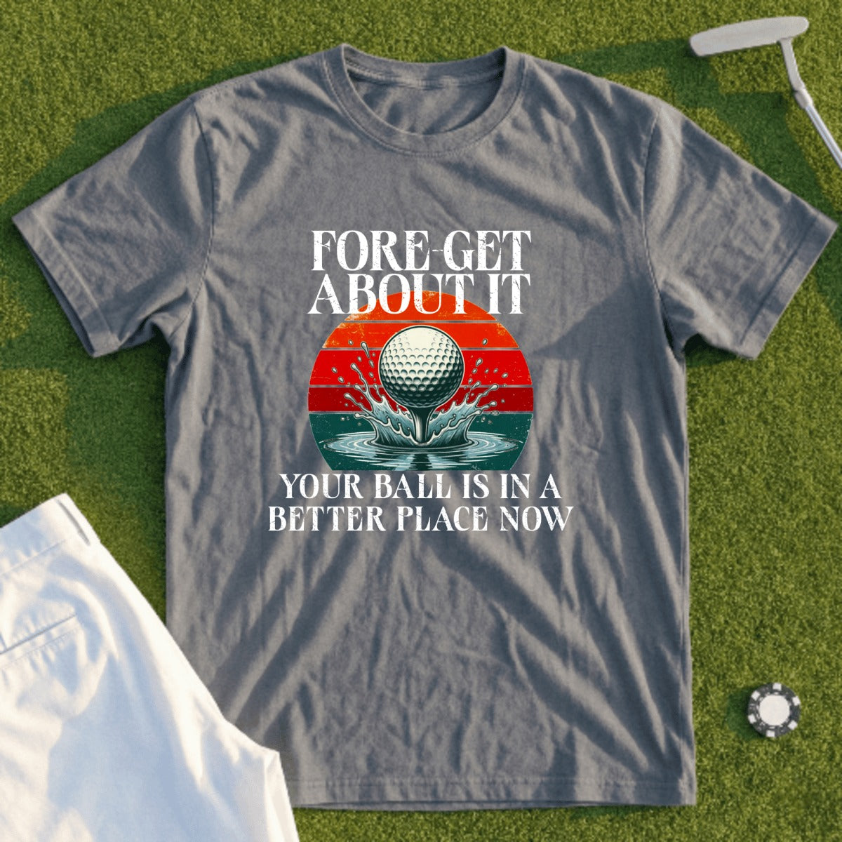 Gray t-shirt with "Fore Get About It" and golf ball splash.