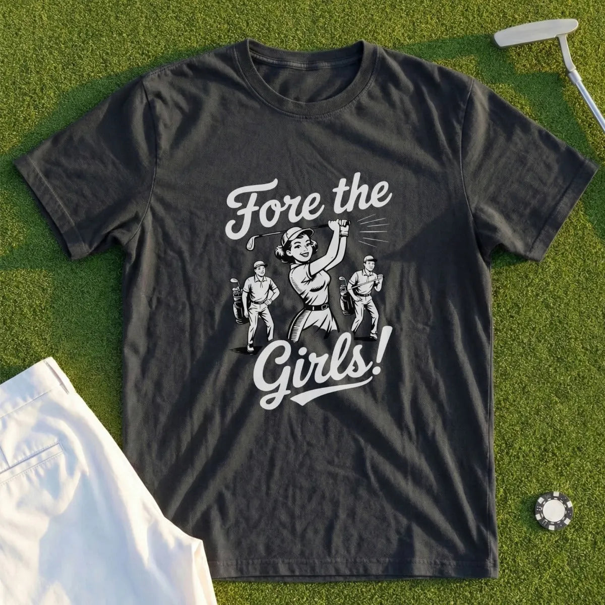 Dark t-shirt with "Fore the Girls!" text and graphic of women golfers.