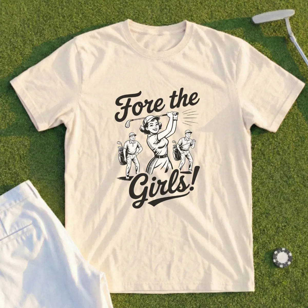 Cream t-shirt with "Fore the Girls!" text and graphic of women golfers.