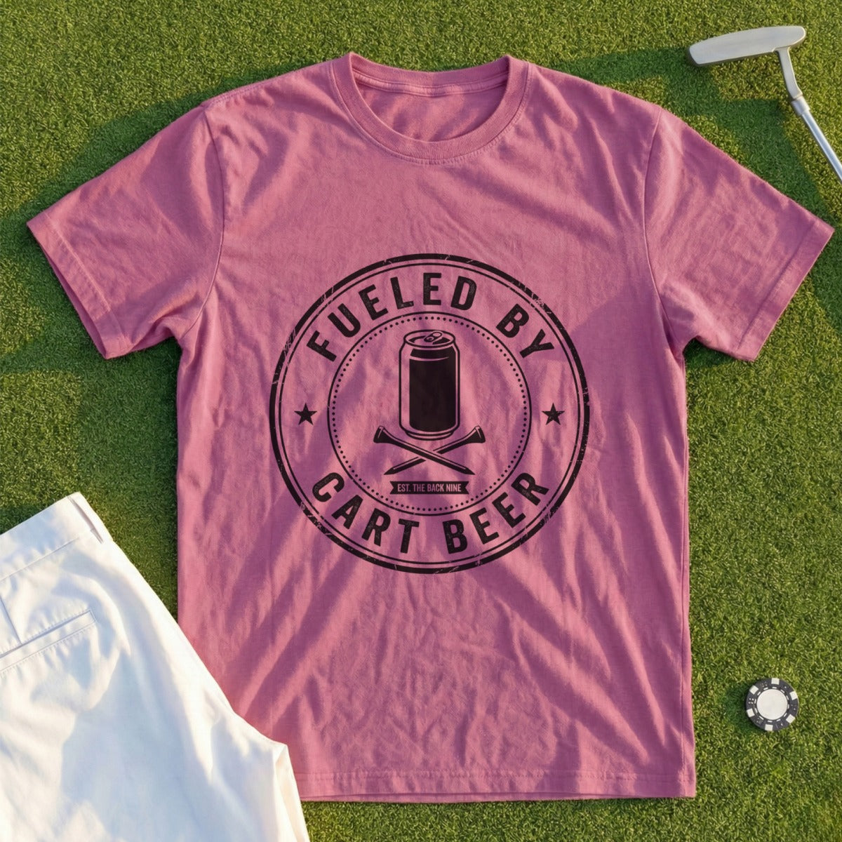 Pink t-shirt with "Fueled by Cart Beer" text and golf club and ball graphics.