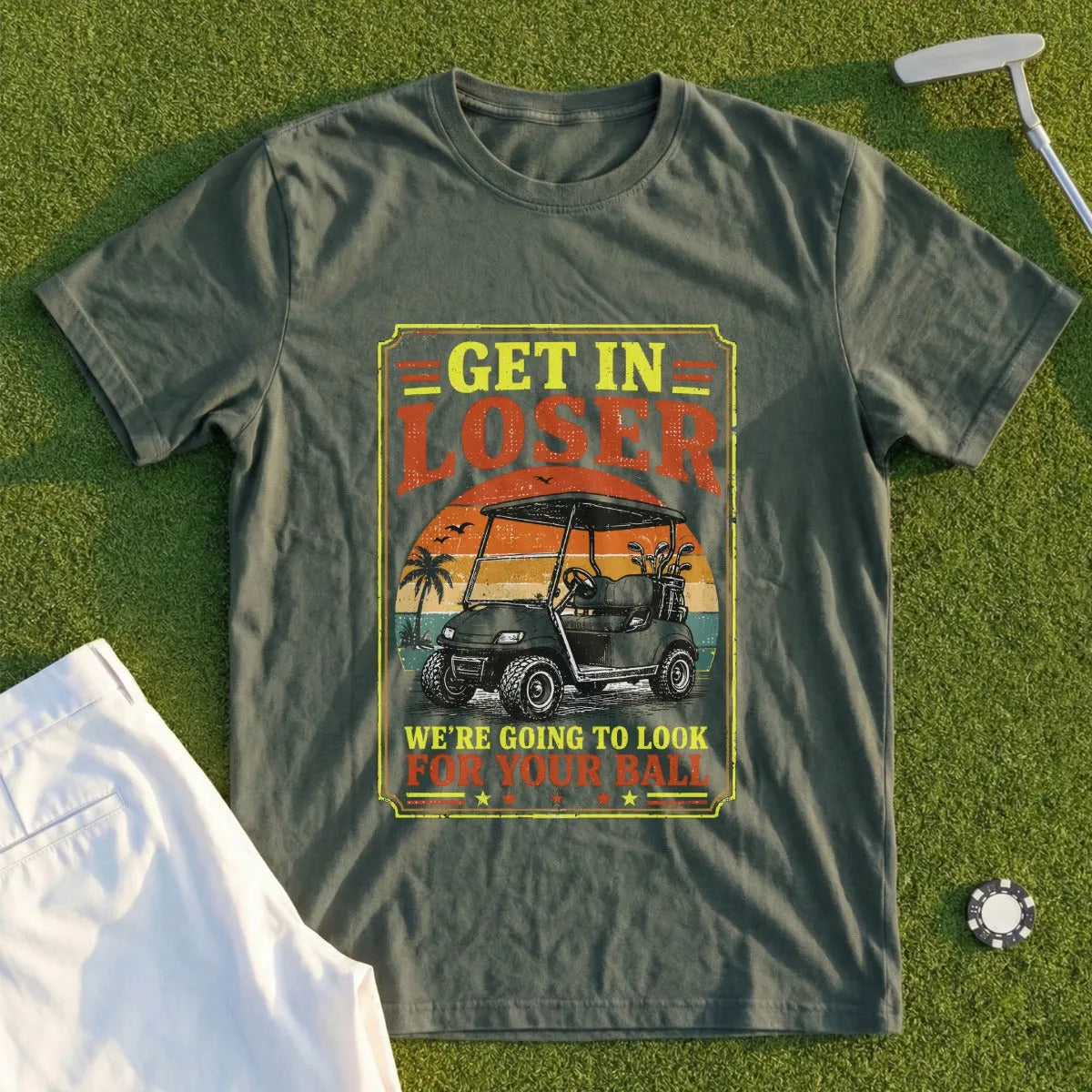 Golf t-shirt with a distressed graphic of a golf cart and the text "GET IN LOSER WE'RE GOING TO LOOK FOR YOUR BALL".