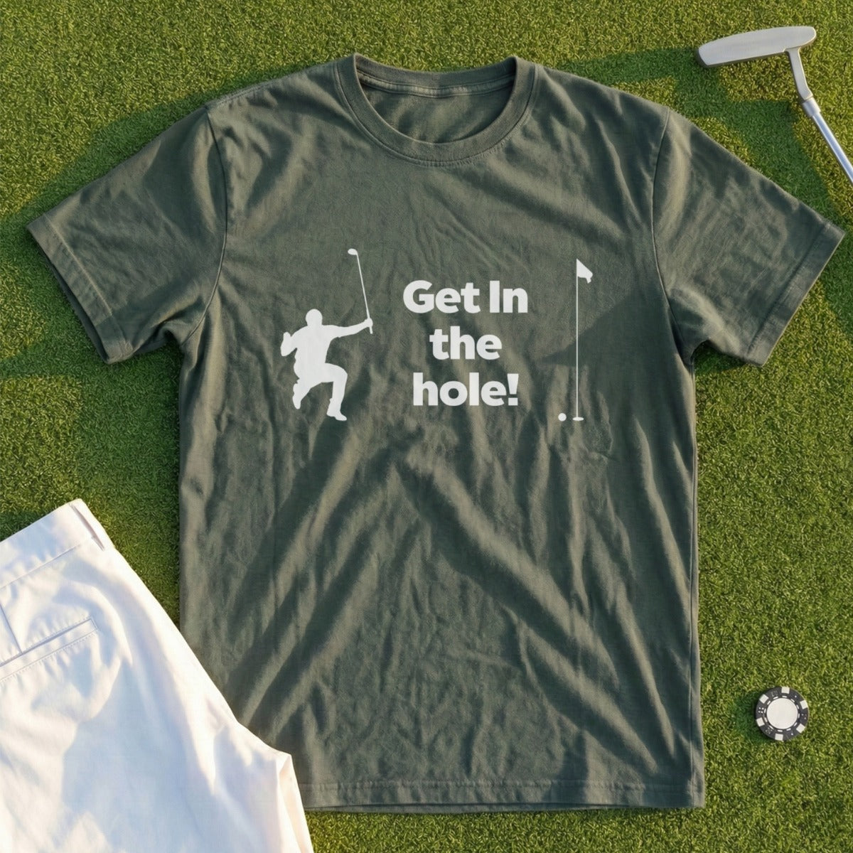 Green t-shirt with "Get In the hole!" slogan and golf graphic.