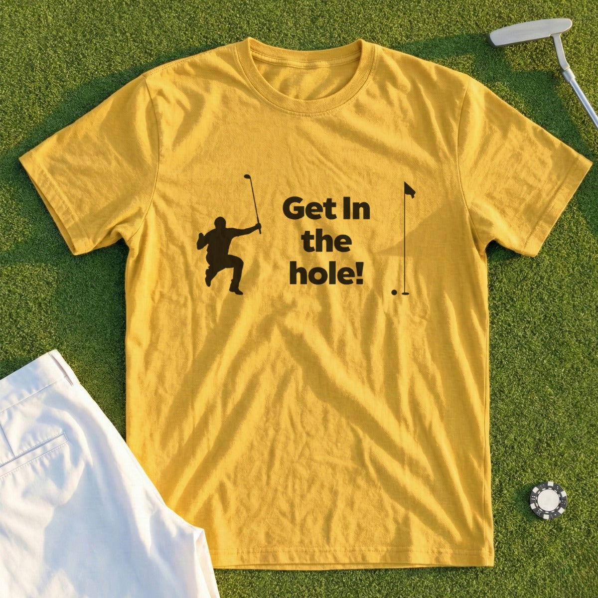 Yellow t-shirt with "Get in the hole!" text and golfer graphic.