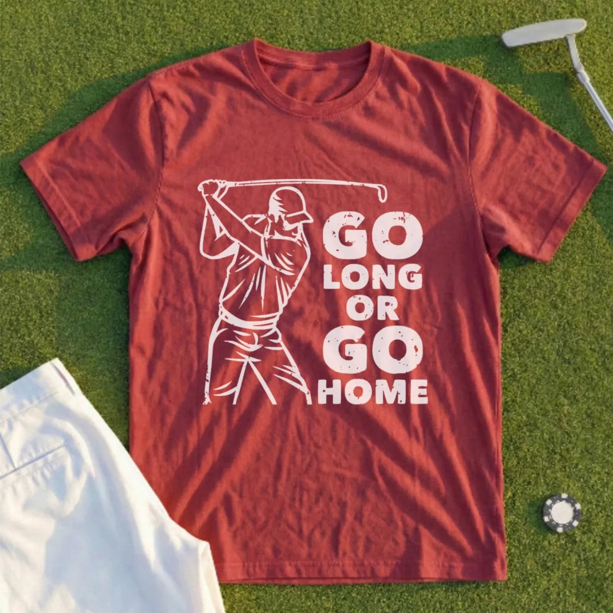 Maroon t-shirt with white graphic of golfer and text "GO LONG OR GO HOME".