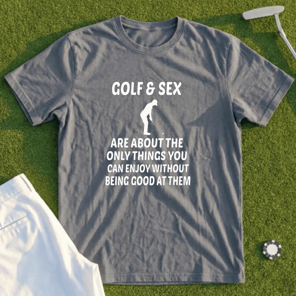 Grey t-shirt with text about golf and sex, and a golf tee.