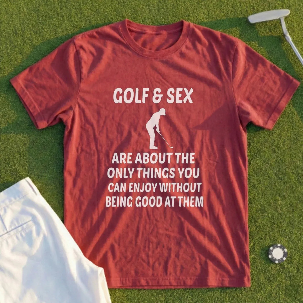 Red t-shirt with white text: Golf & Sex are about the only things you can enjoy without being good at them.