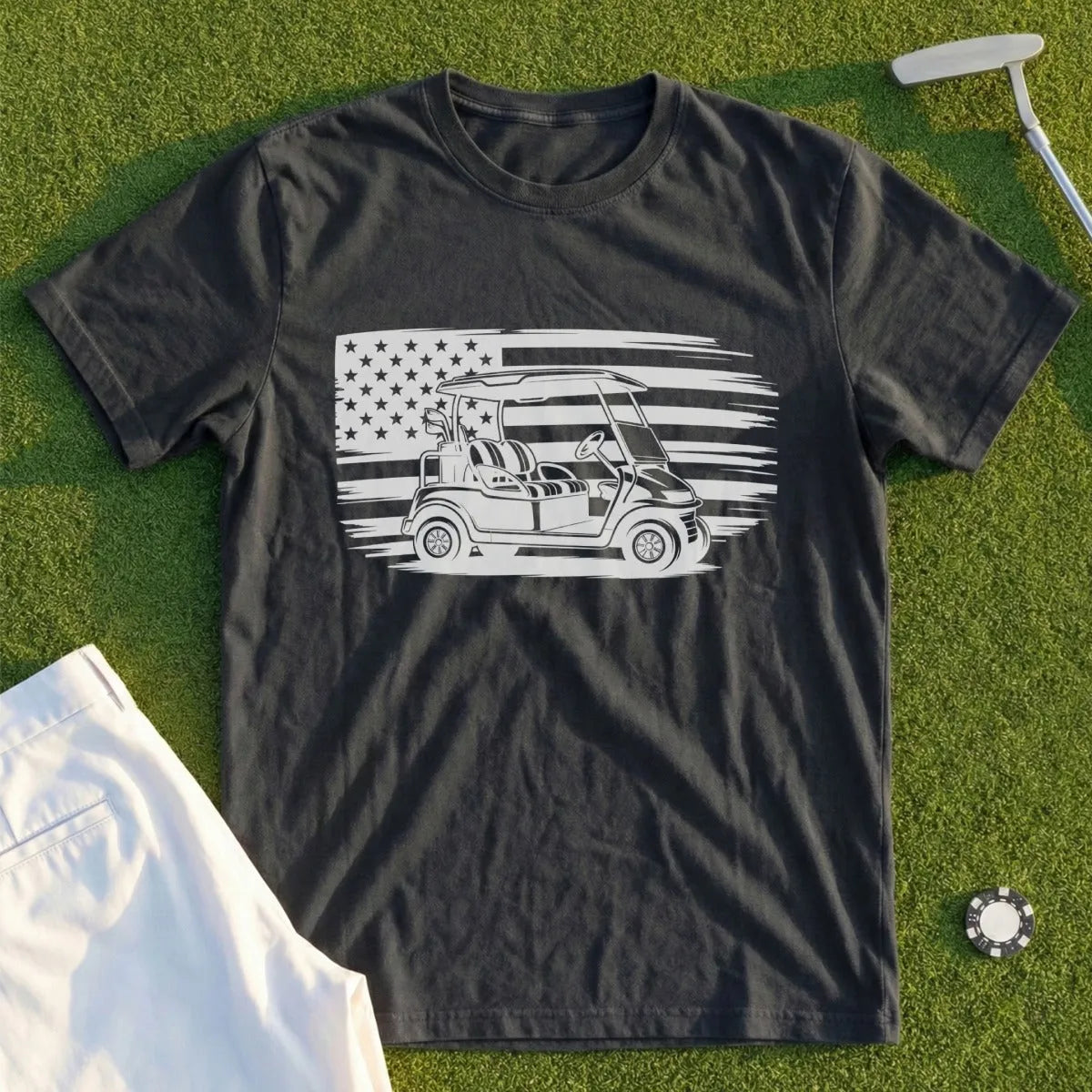 Dark t-shirt with white graphic of a golf cart and American flag.