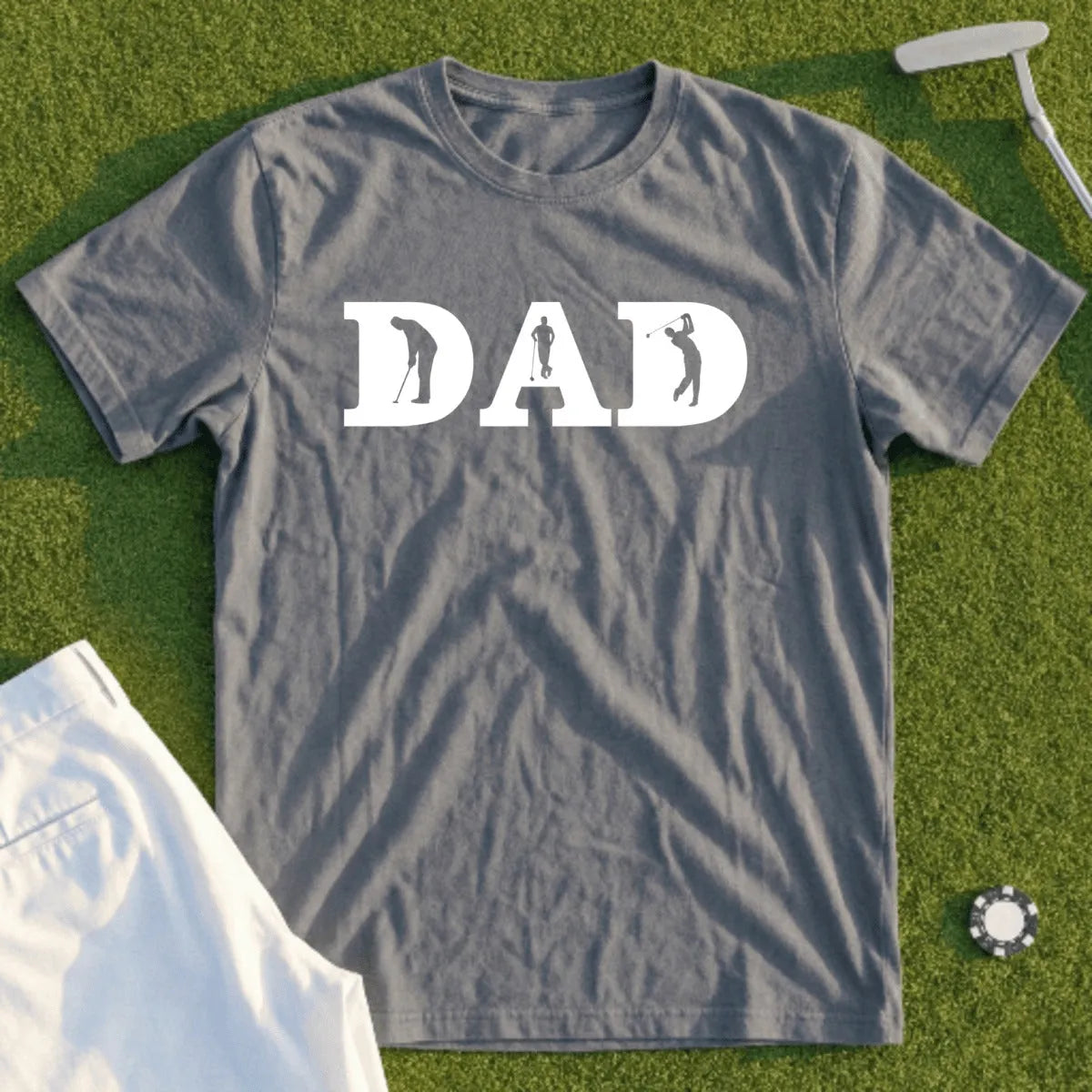 Grey t-shirt with "DAD" in white letters and two golfer silhouettes.