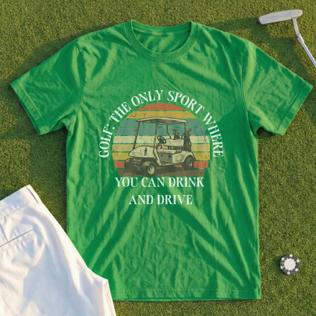 Green t-shirt with "Golf: The Only Sport Where You Can Drink and Drive" and golf cart graphic.