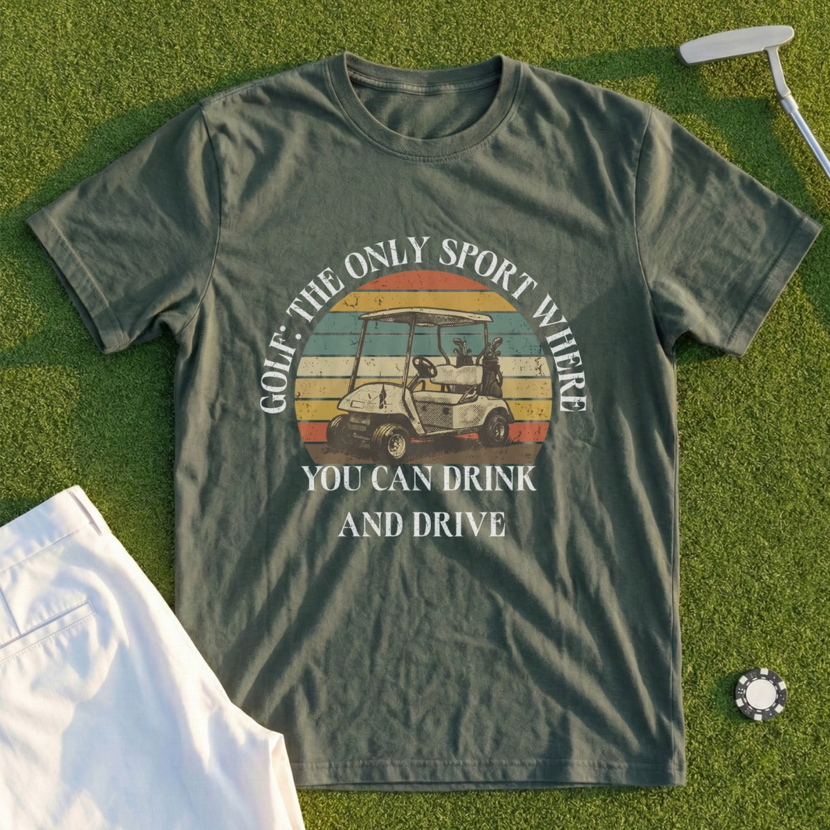 Green t-shirt with vintage golf cart graphic and text "GOLF: THE ONLY SPORT WHERE YOU CAN DRINK AND DRIVE".