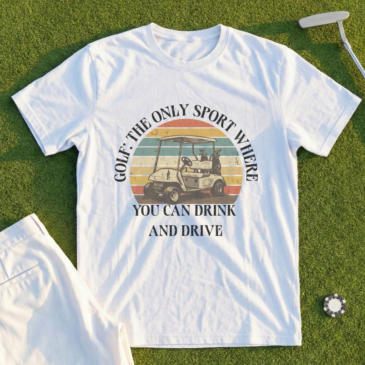 White t-shirt with graphic of golf cart and text "Golf: The Only Sport Where You Can Drink and Drive".