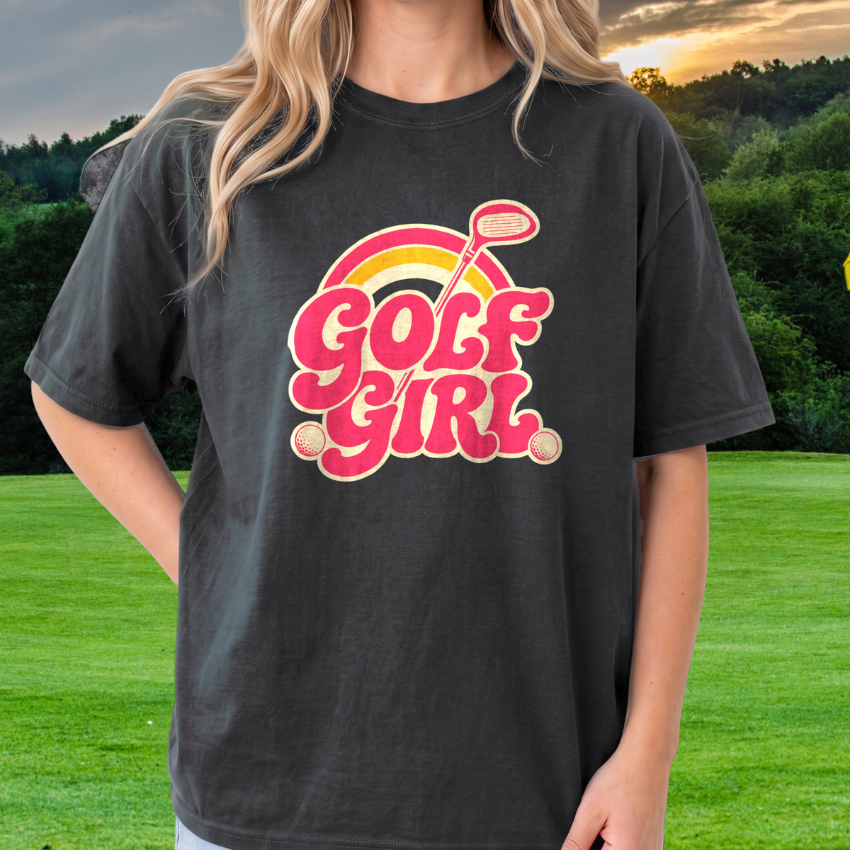 Golf Girl, Groovy Script Sunset Tee worn on the golf course, Black