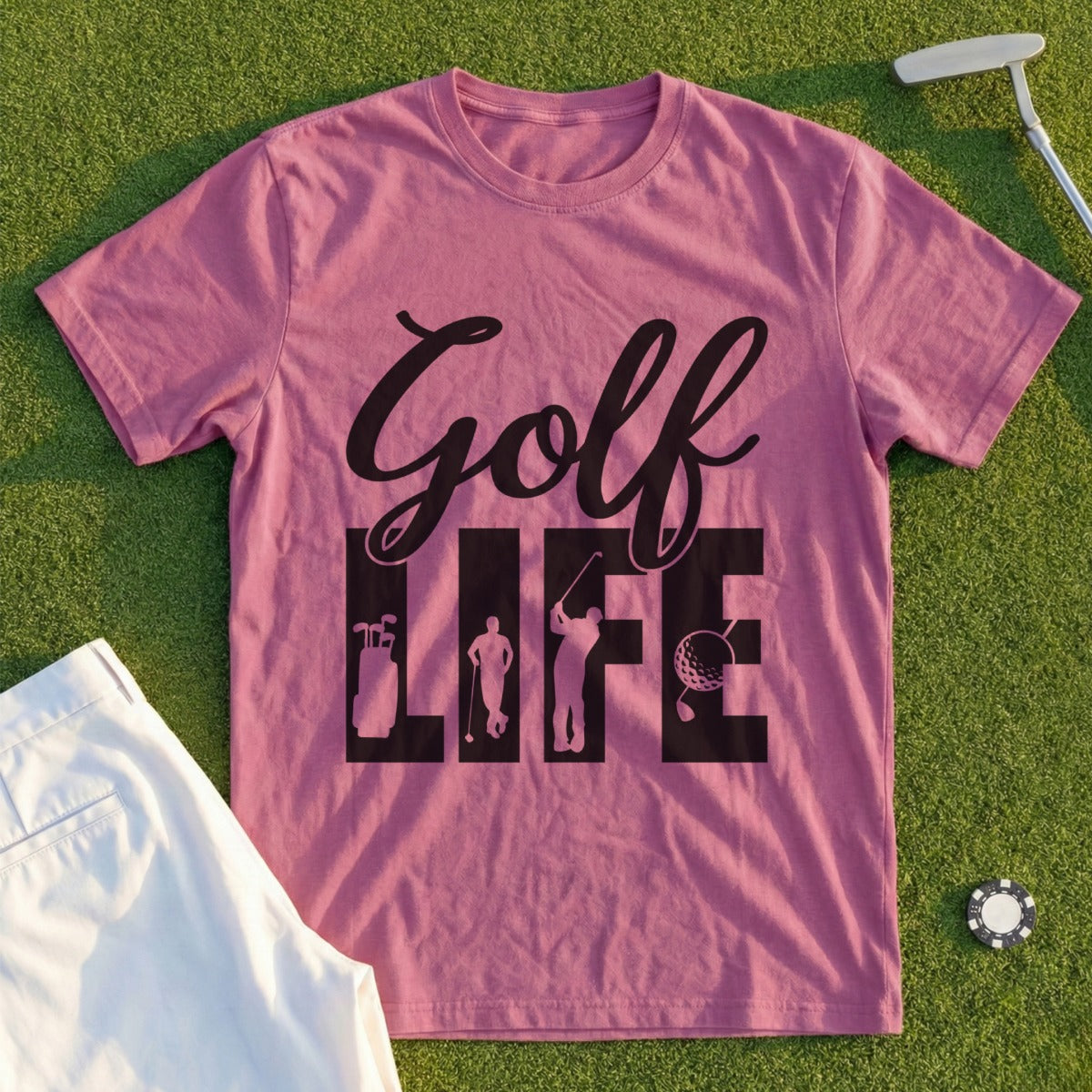 Pink t-shirt with "Golf Life" text and golf-themed graphics.