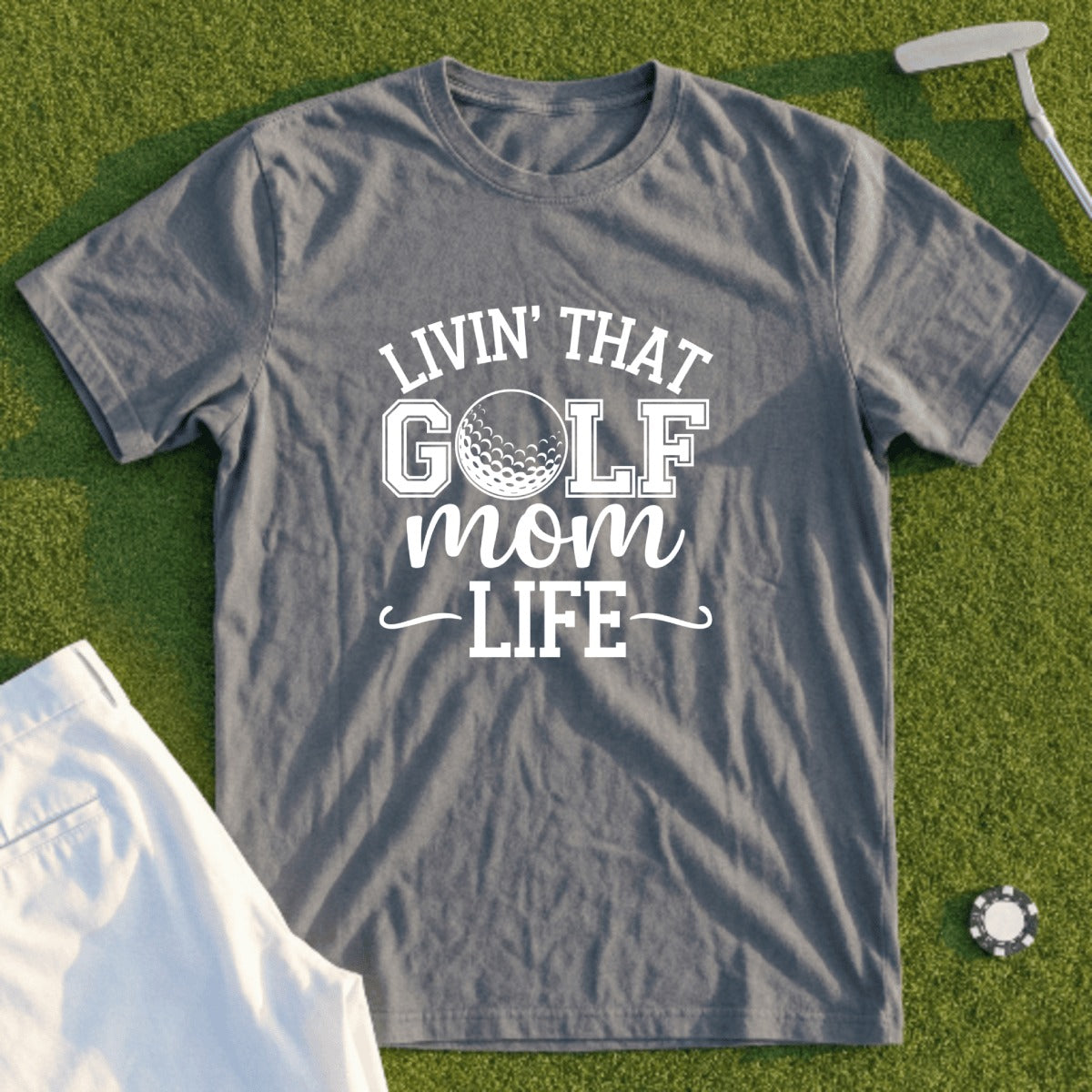 Gray t-shirt with "Livin' That Golf Mom Life" text and golf ball graphic.