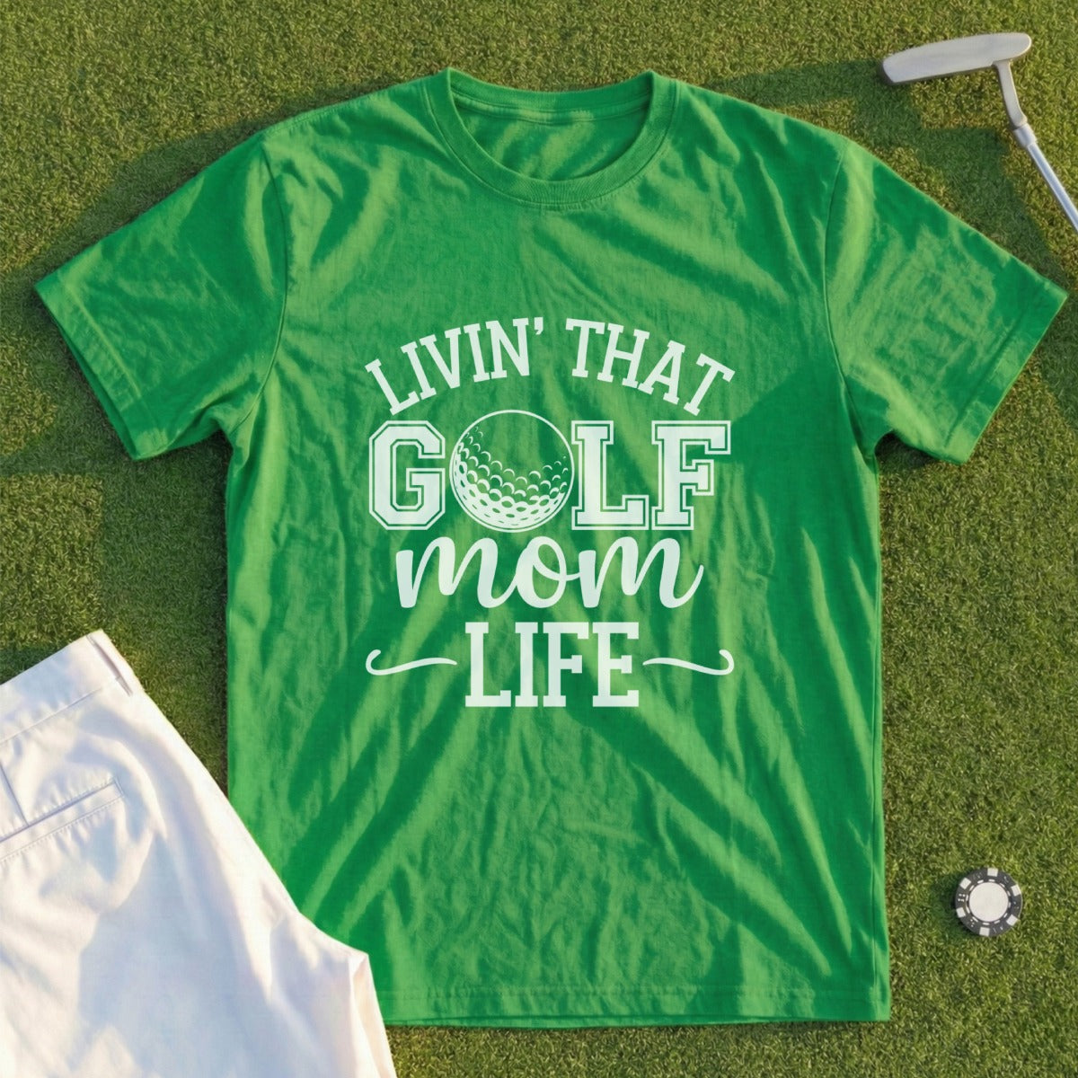 Green t-shirt with "Livin' That Golf Mom Life" and a golf ball graphic.