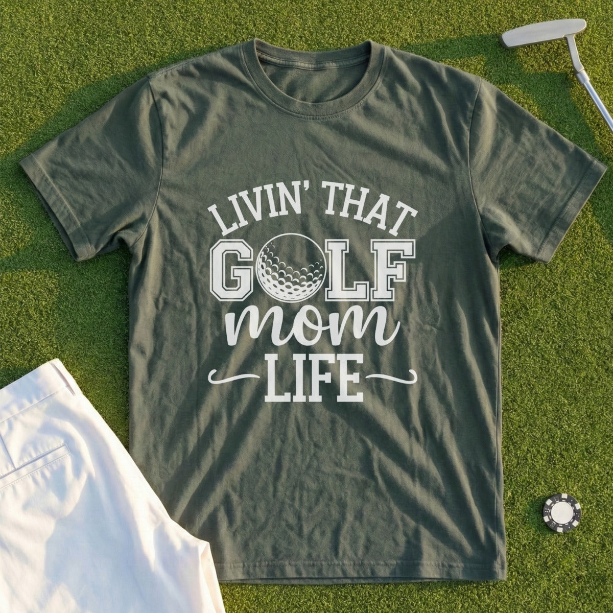 Green t-shirt with "Livin' That Golf Mom Life" and a golf ball graphic.