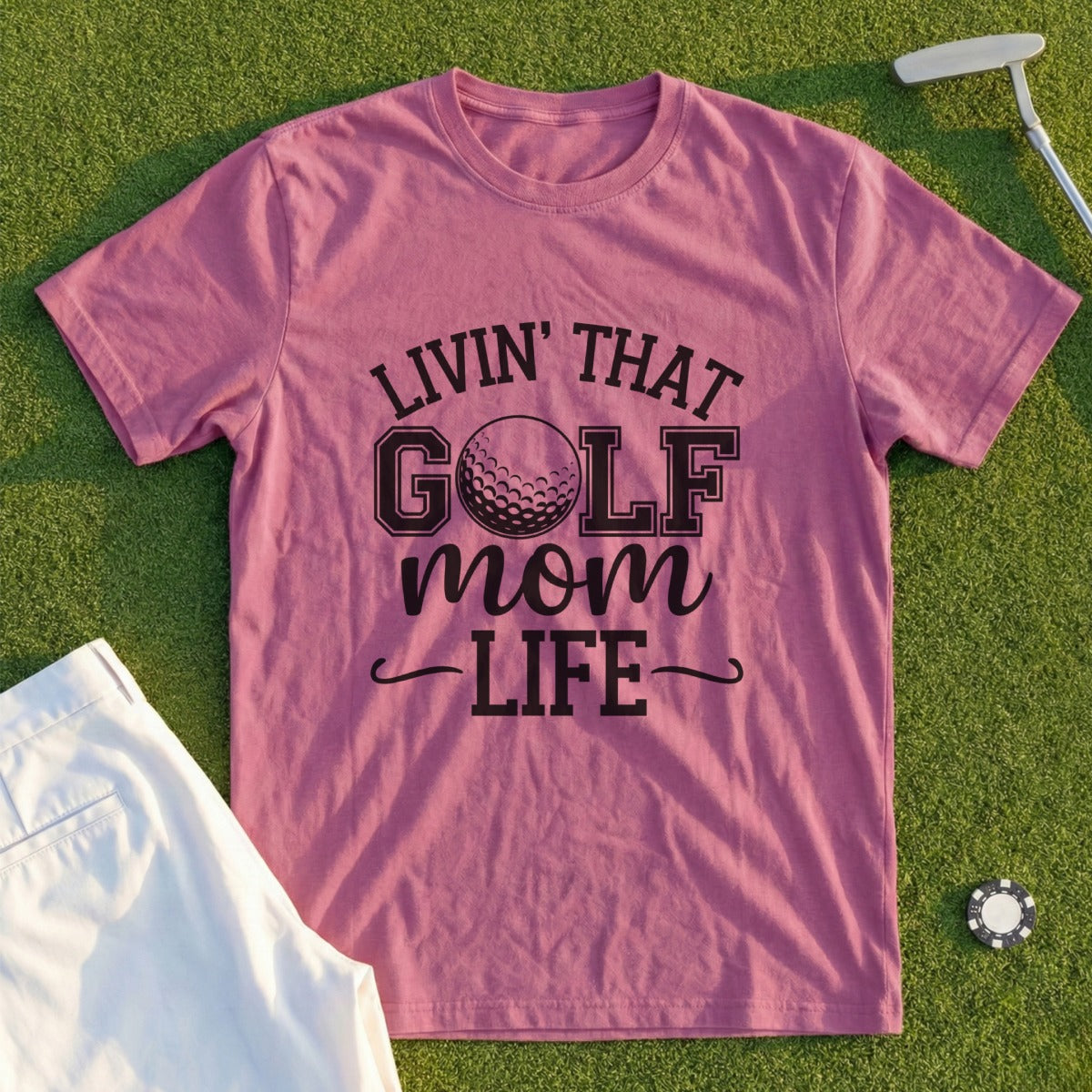 Rose t-shirt with "Livin' That Golf Mom Life" text and golf ball graphic.
