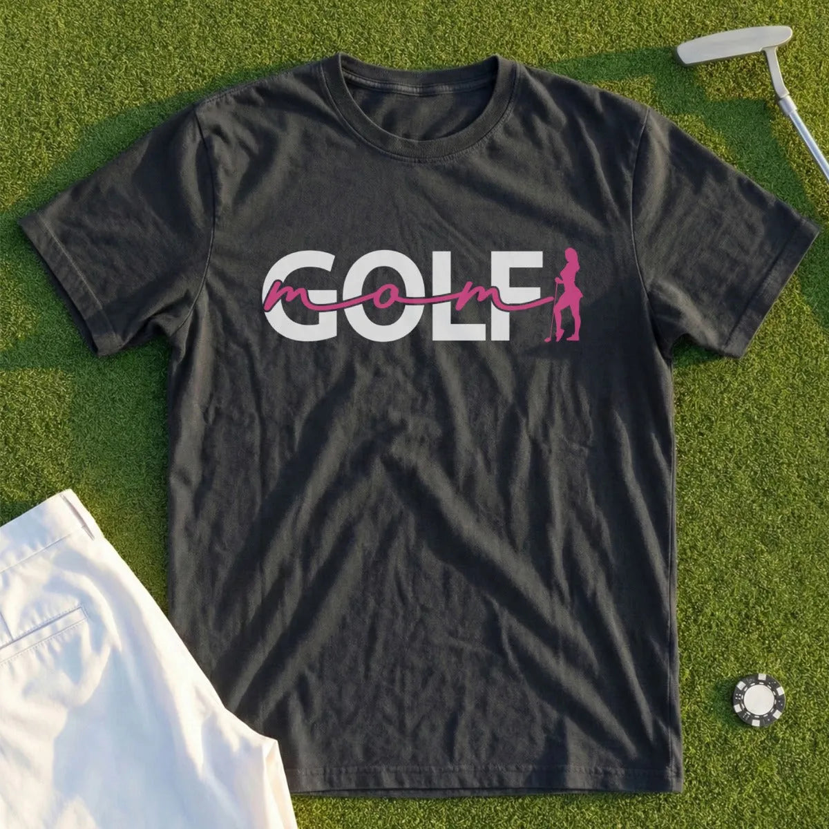 Dark grey t-shirt with white "GOLF" text and pink female golfer graphic.