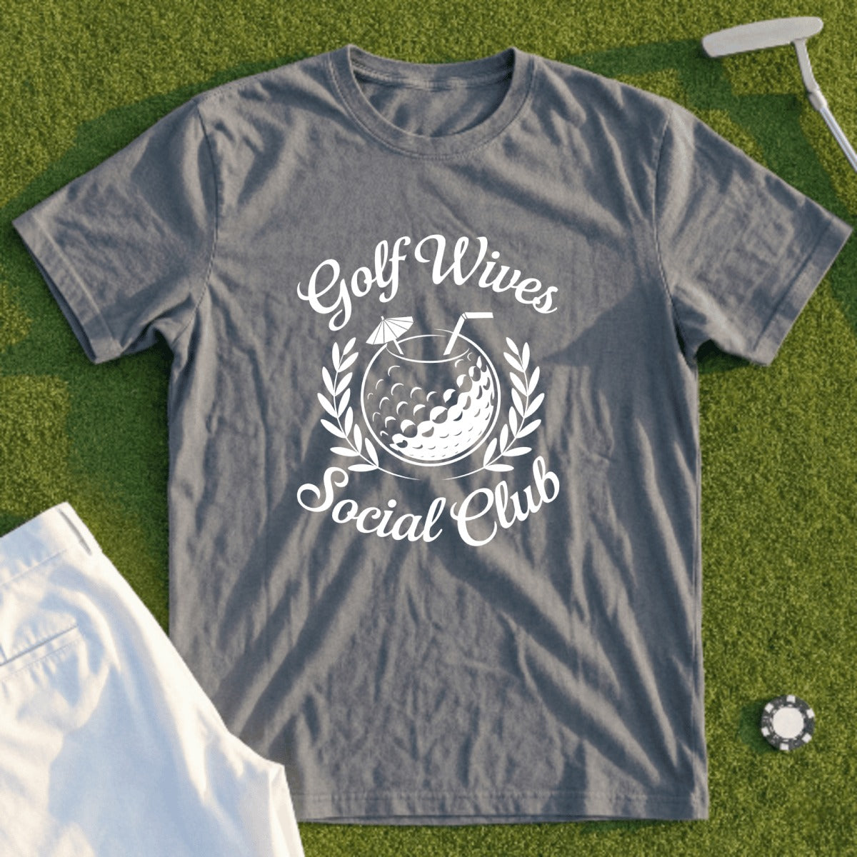 Gray t-shirt with "Golf Wives Social Club" text and a golf ball cocktail emblem.