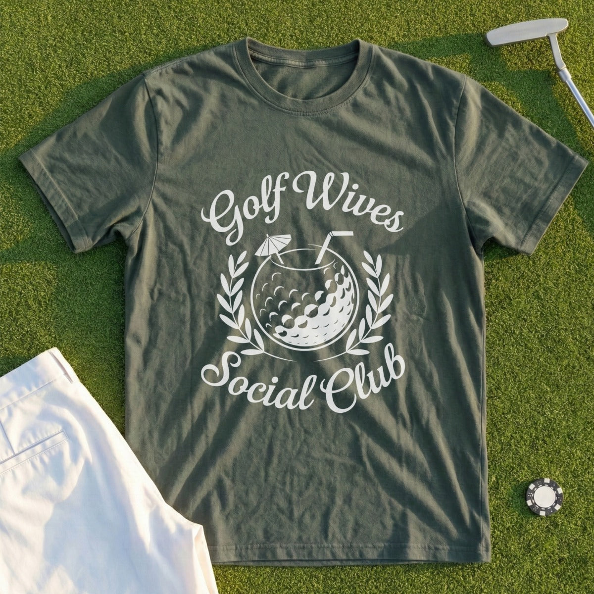 Dark green t-shirt with "Golf Wives Social Club" text and golf ball graphic.