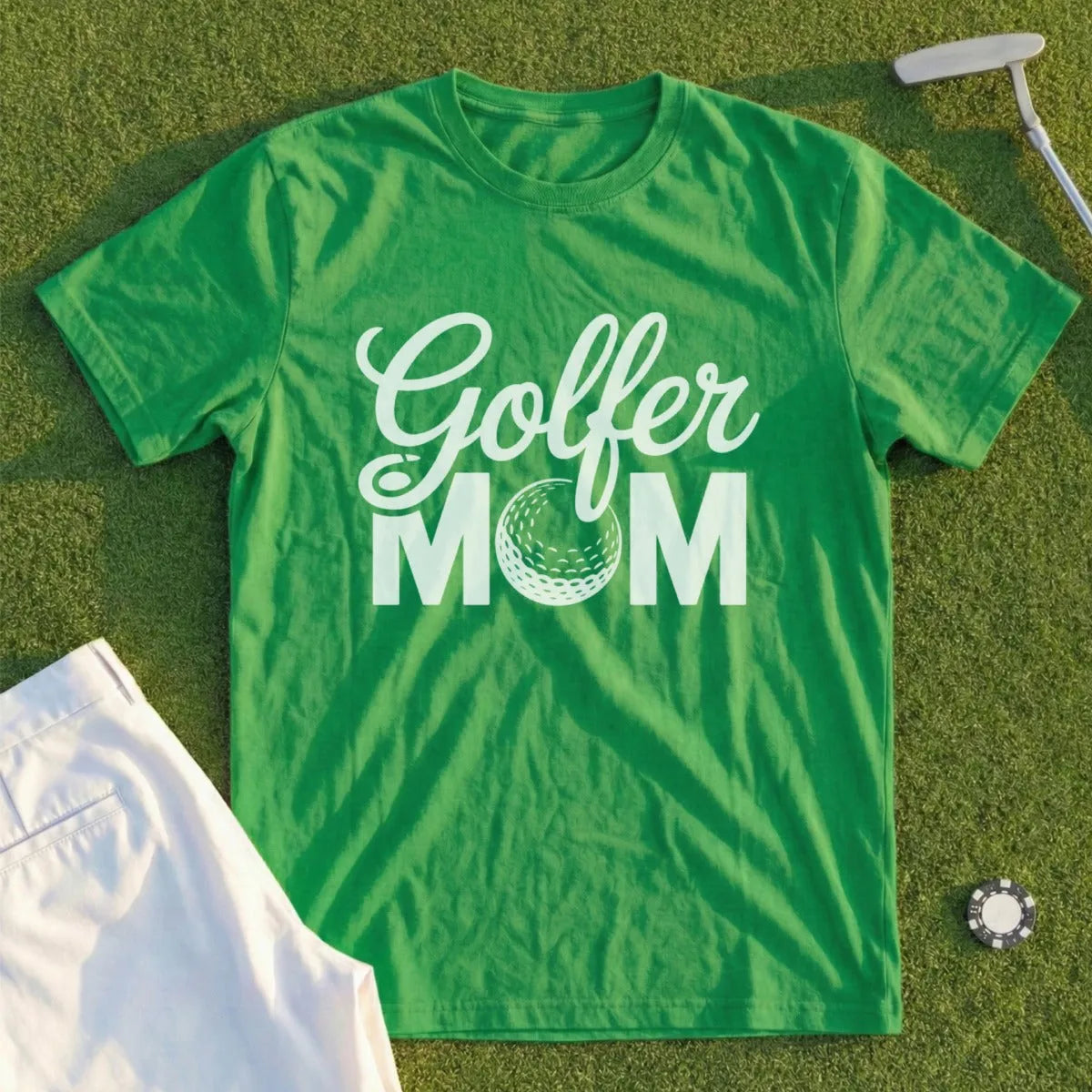 Green t-shirt with "Golfer Mom" and golf ball graphic.