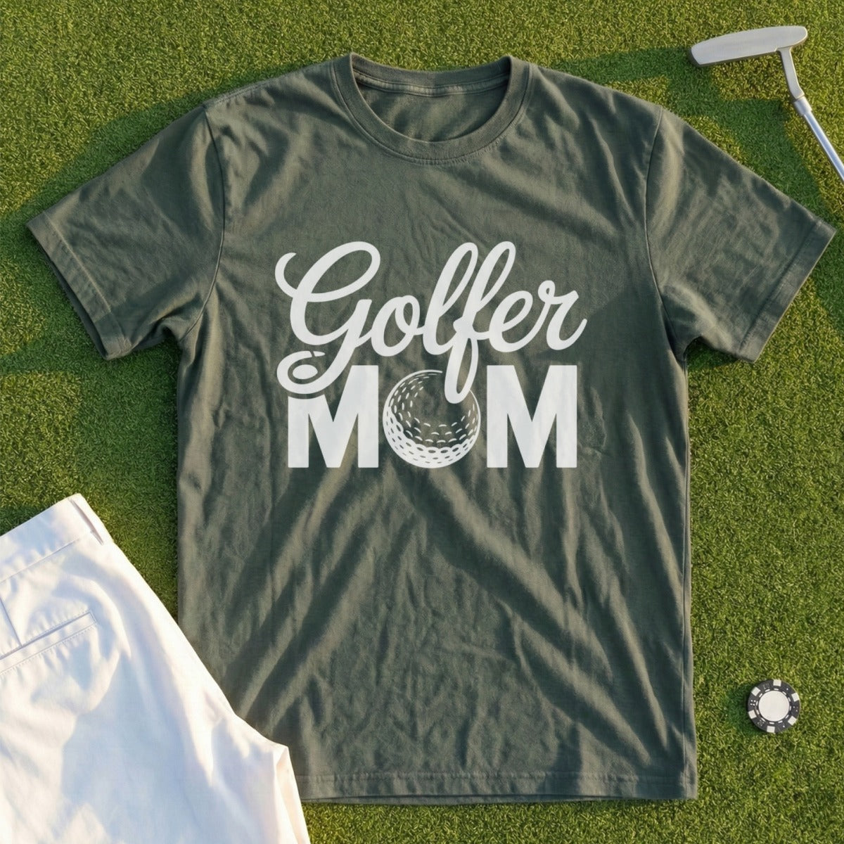Dark green t-shirt with "Golfer Mom" and golf ball graphic.