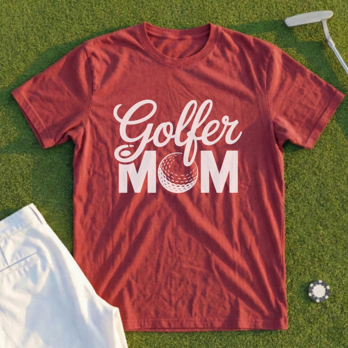 Maroon t-shirt with "Golfer Mom" text and golf ball graphic.