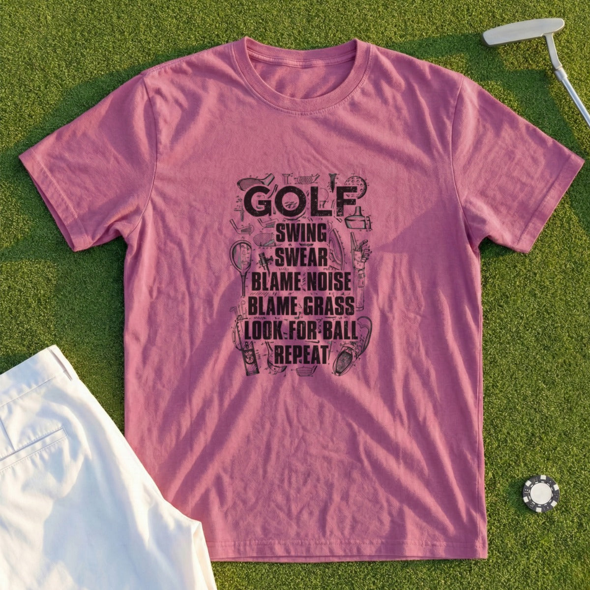 Pink t-shirt with "Golf" and related phrases in stacked text.