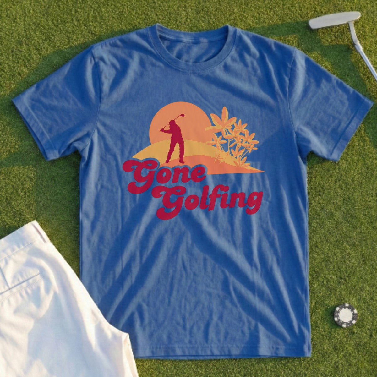 Blue t-shirt with "Gone Golfing" text and a sunset golf scene graphic.