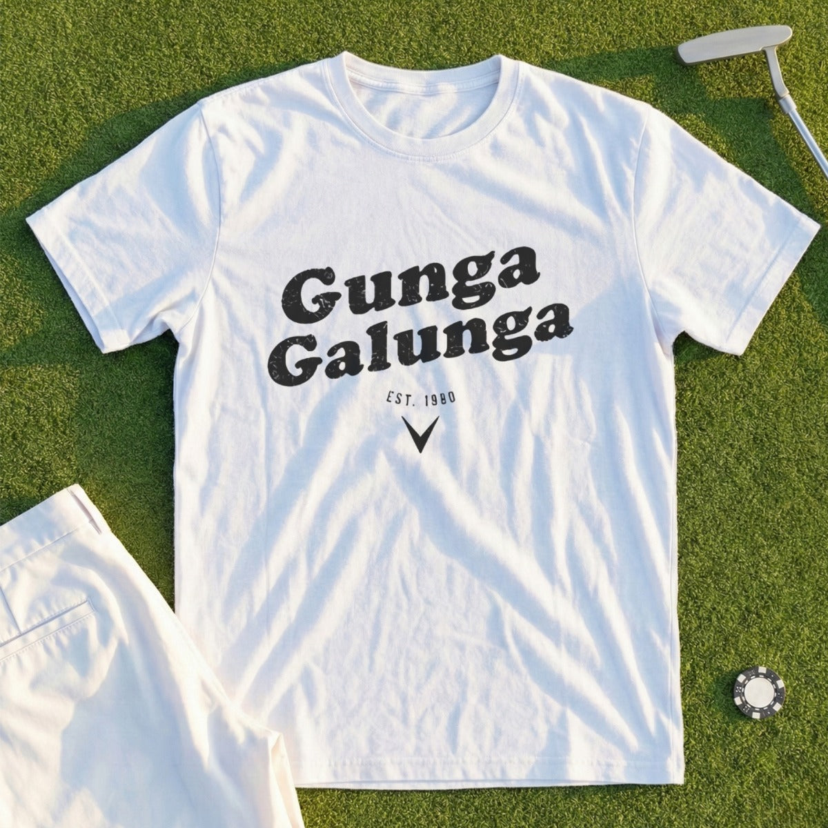 White t-shirt with "Gunga Galunga EST. 1980" printed on front.