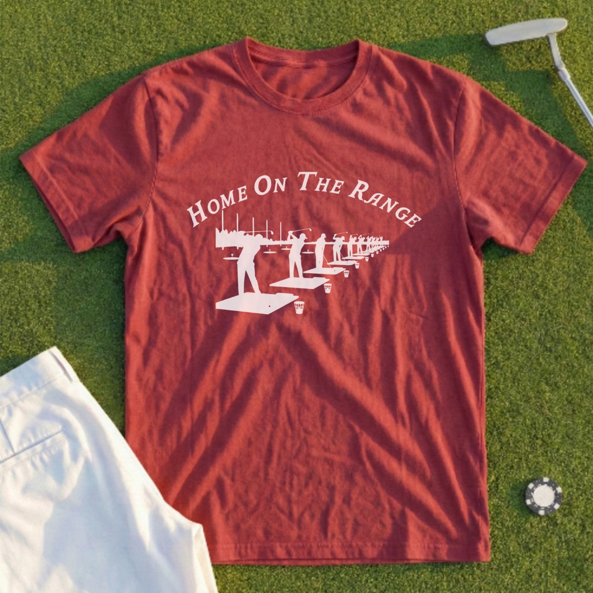 Maroon t-shirt with "Home On The Range" and golf driving range scene graphic.