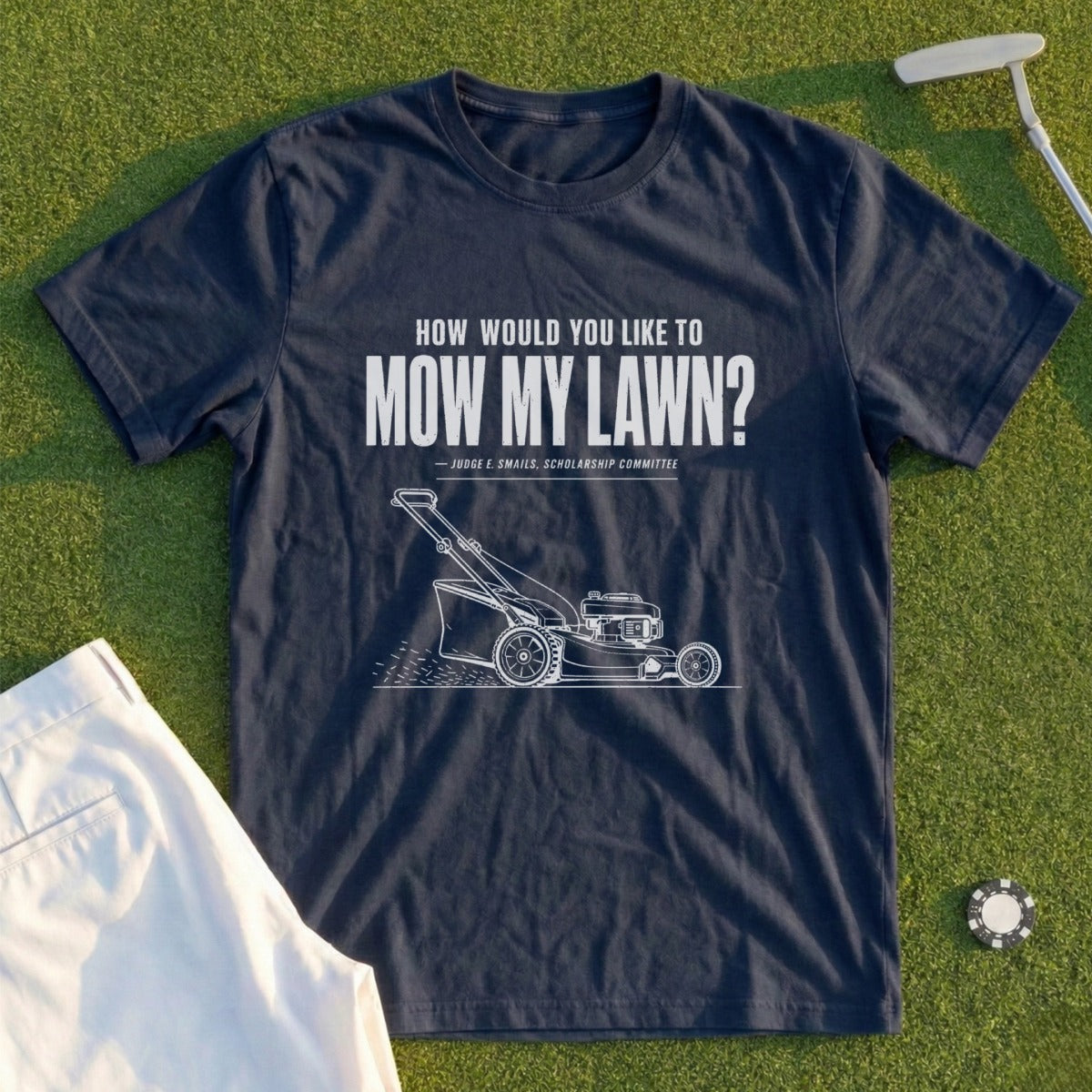 Navy t-shirt with graphic of a lawnmower and text "How would you like to mow my lawn?".