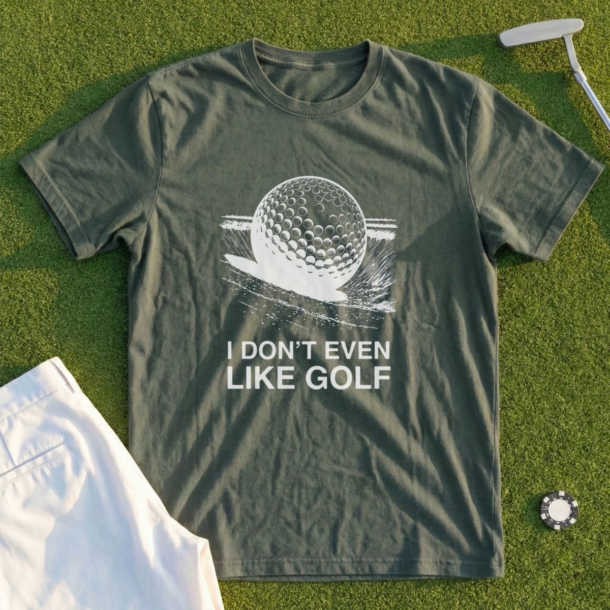 Green t-shirt with "I DON'T EVEN LIKE GOLF" and a golf ball graphic.