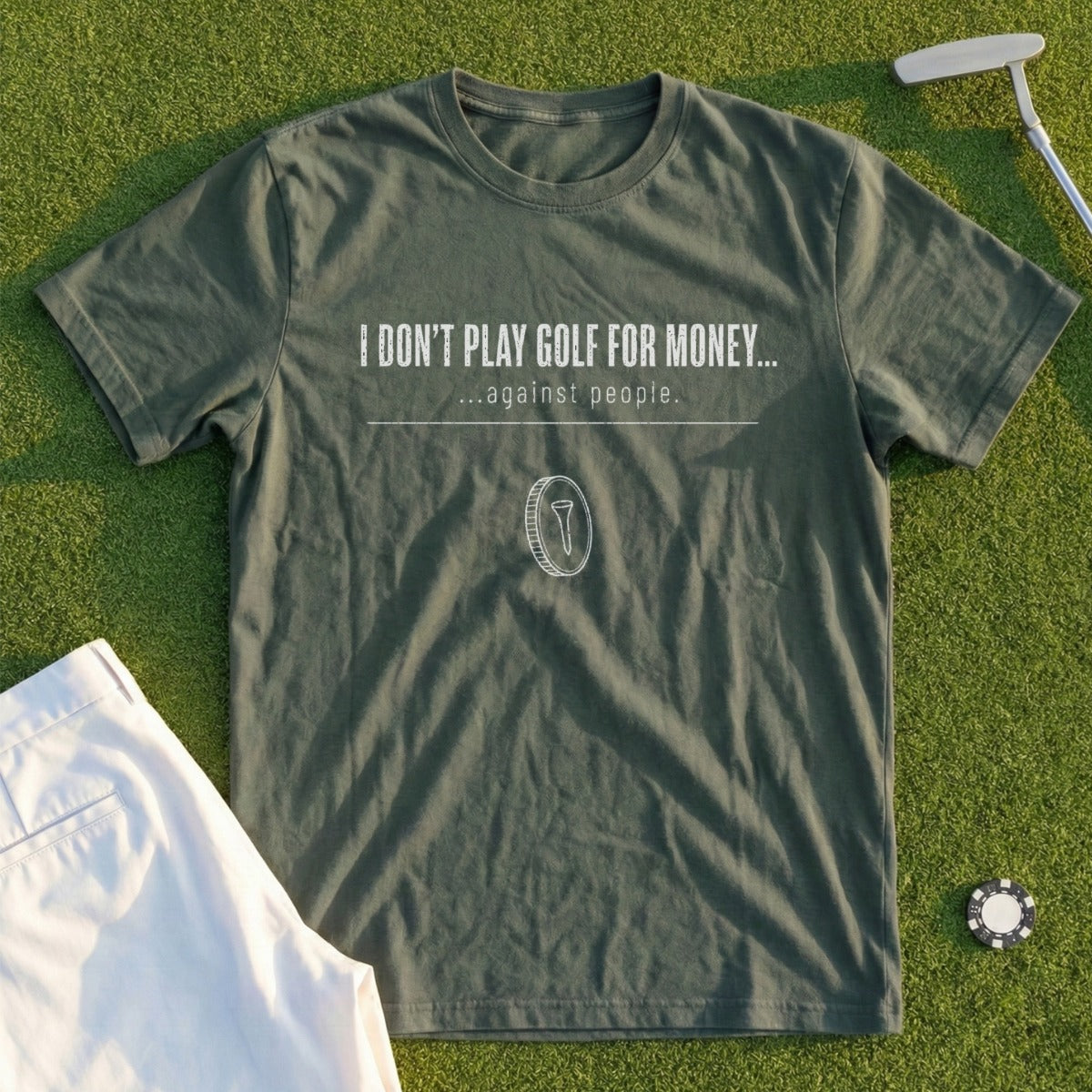 Olive t-shirt with white text "I DON'T PLAY GOLF FOR MONEY... ...against people." and a coin graphic.