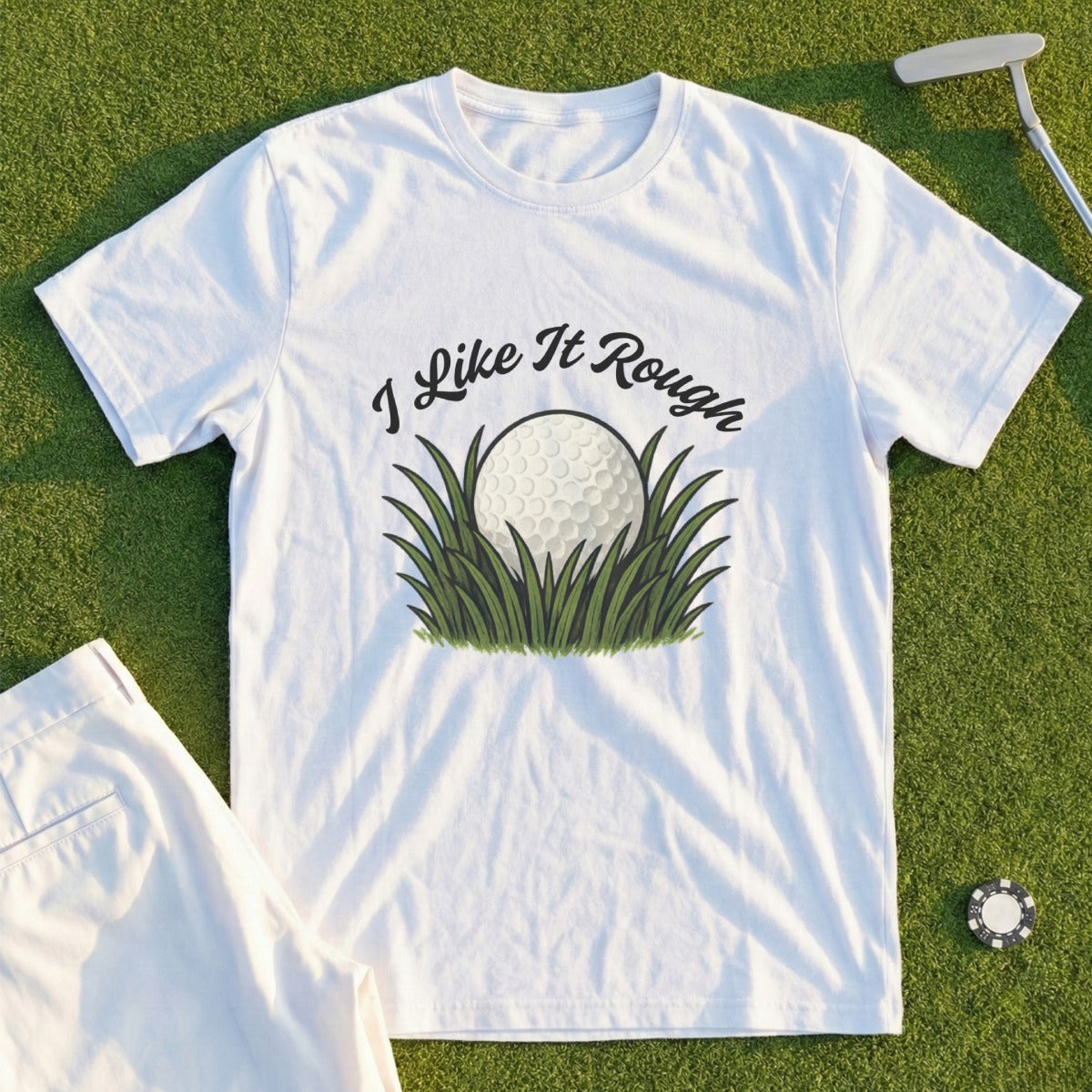 White t-shirt with "I Like It Rough" and a golf ball in grass design.